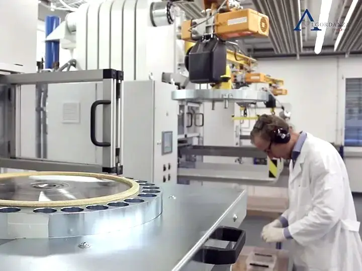 A technician checking a diamond in the Swiss laboratory